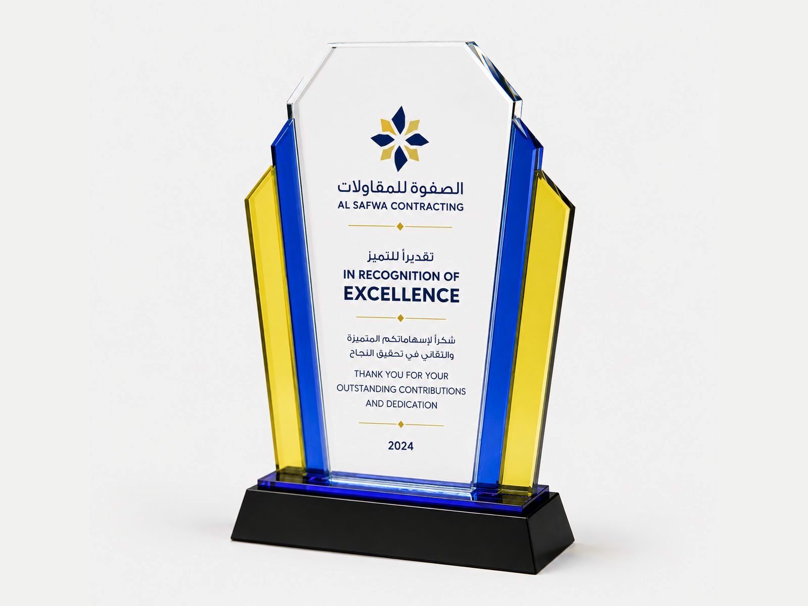 A shield-shaped crystal with blue and gold side accents on a black base.