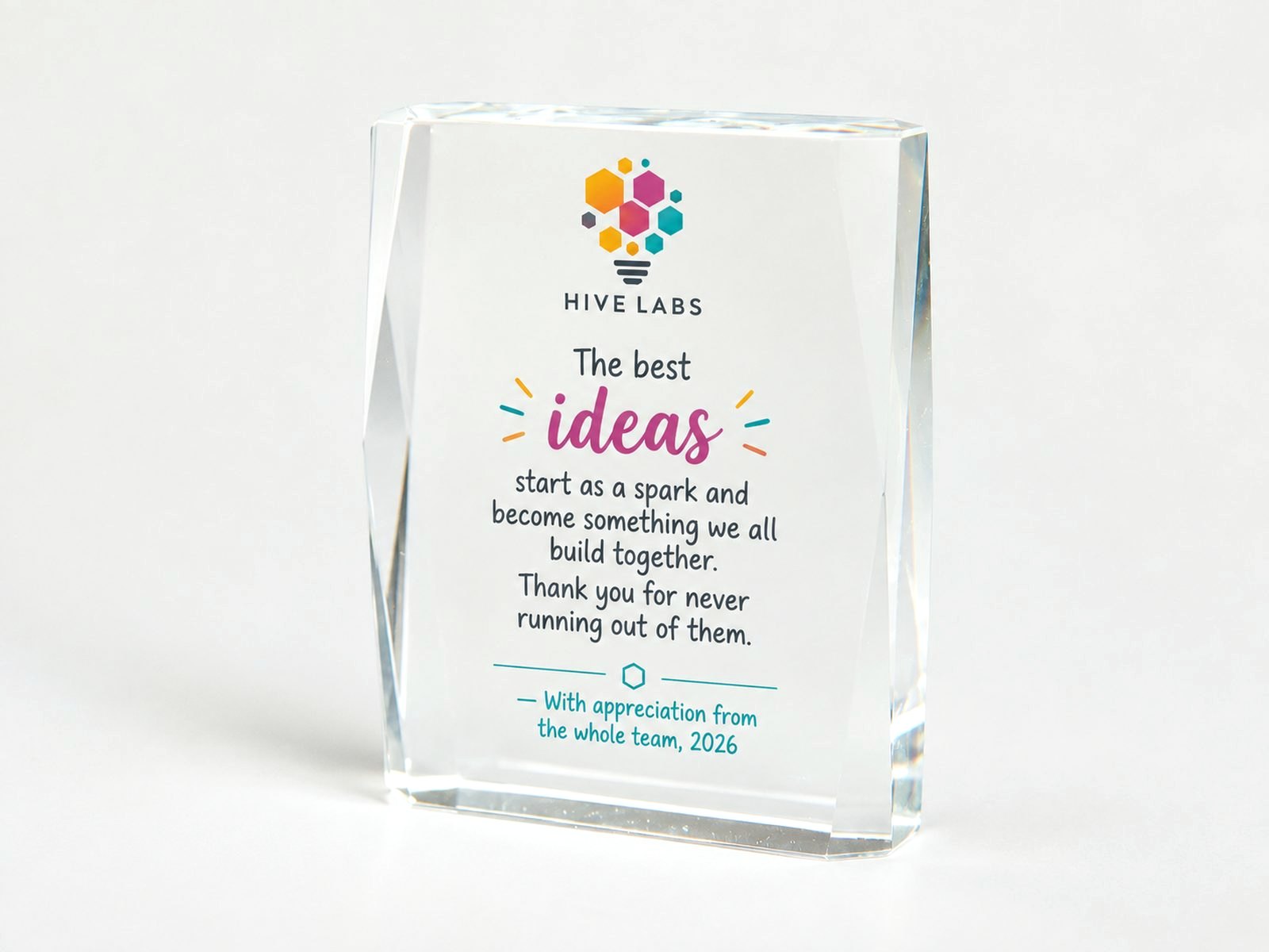 A clear rectangular crystal block that stands on its own edge.