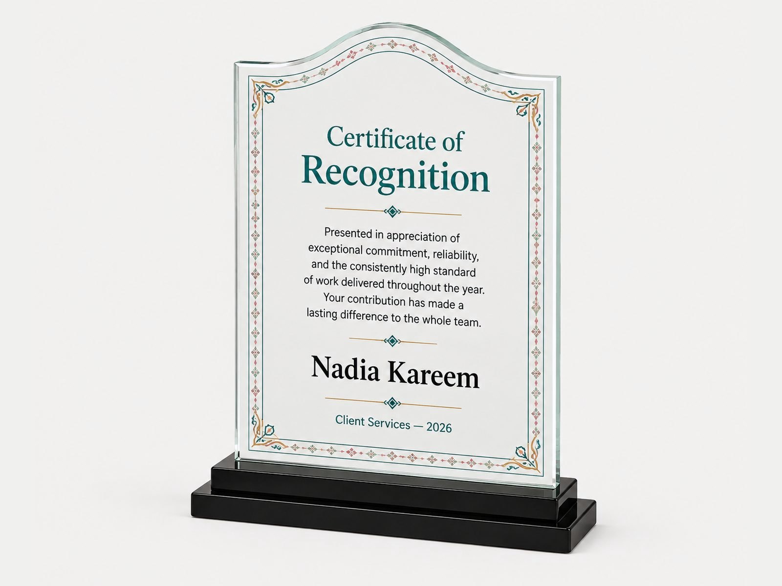An arch-topped crystal plaque on a black base, printed in a certificate-style layout.