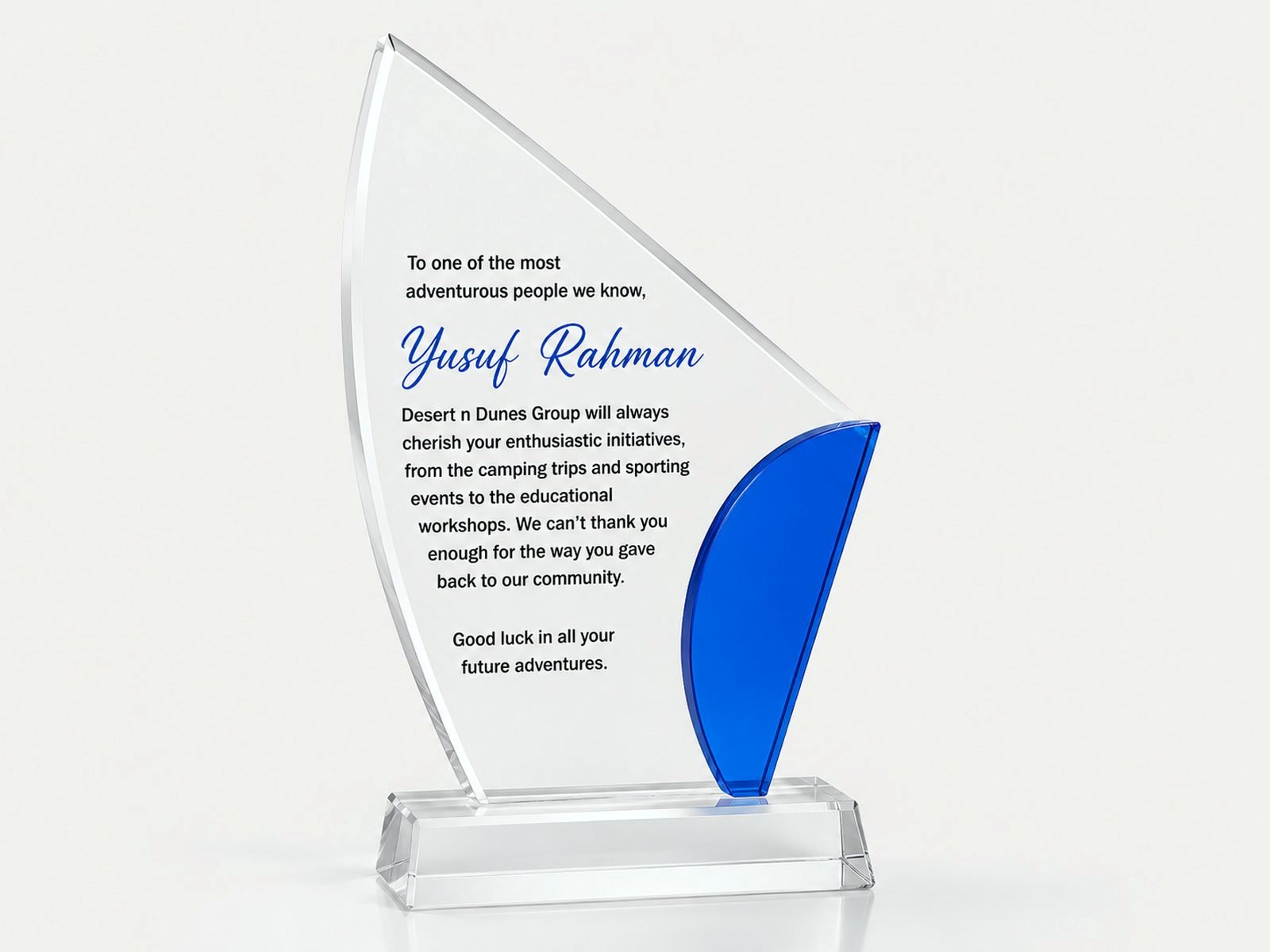A sail-shaped crystal with a blue accent wing.