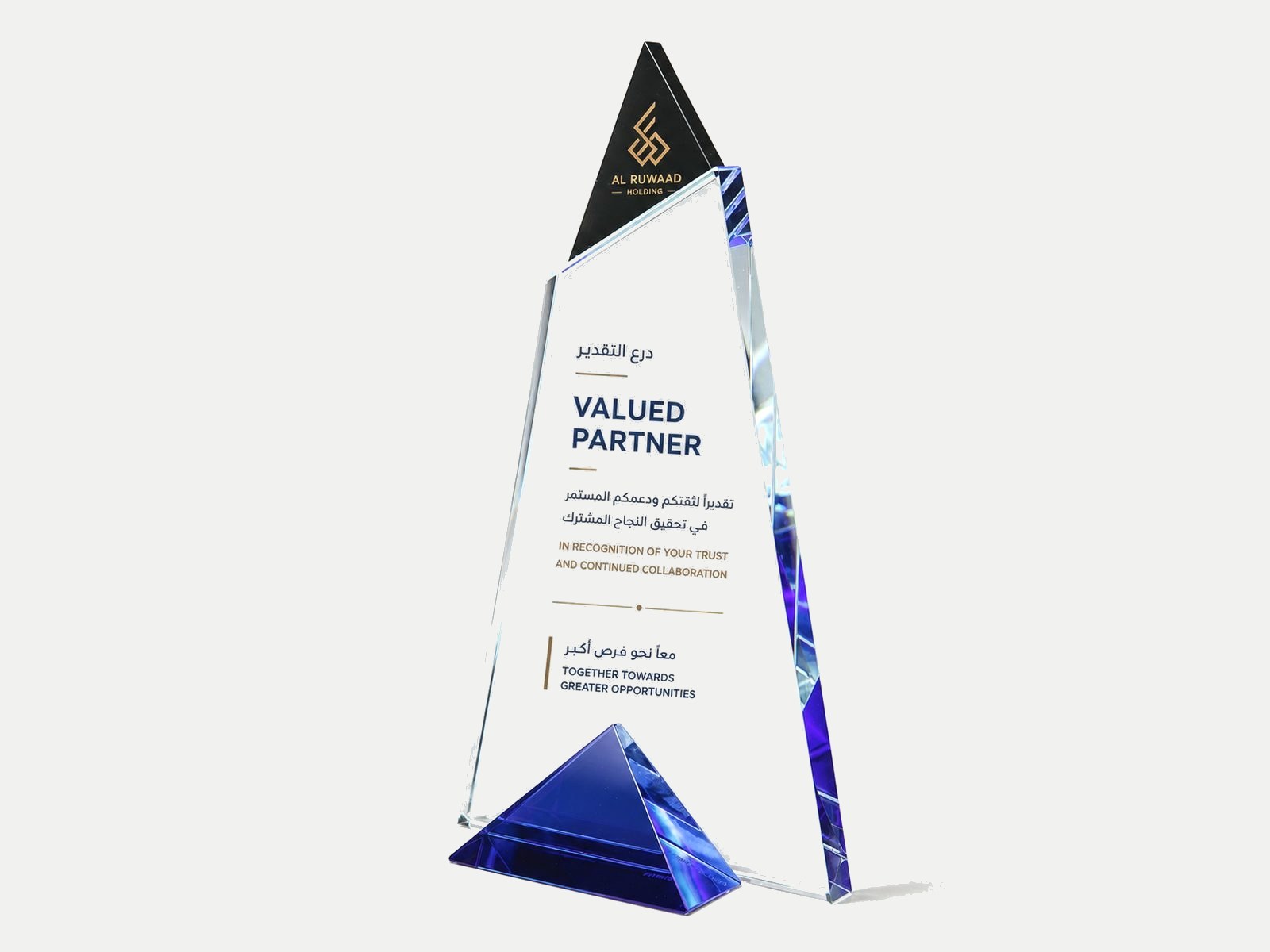 A triangular crystal with a blue-tinted lower edge.