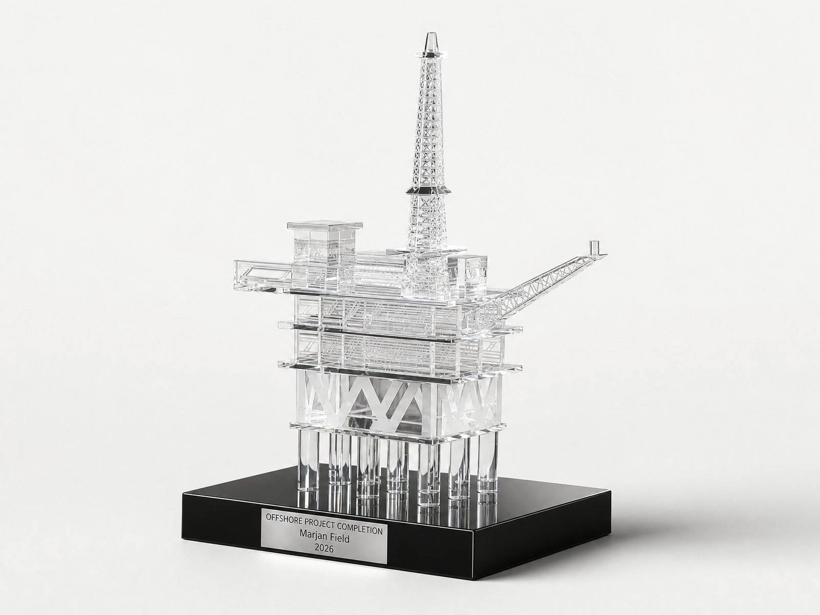 A detailed crystal model of an offshore platform on a black base.