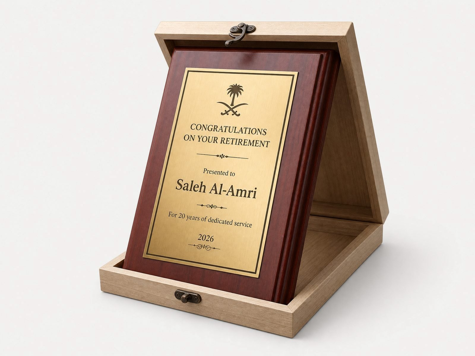 A wood plaque with an engraved brass plate, supplied in a presentation box.