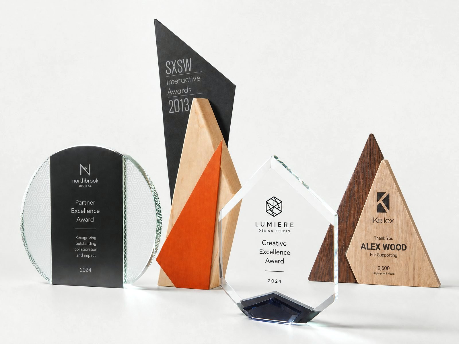 Trophies and awards in glass, crystal, wood and acrylic, engraved and printed with company logos and recipient names